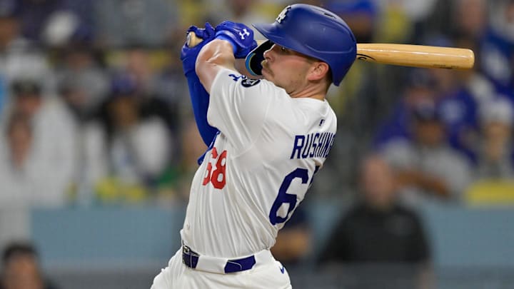 May 15, 2025; Los Angeles, California, USA; Los Angeles Dodgers catcher Dalton Rushing (68) singles against the Athletics during the third inning of the game at Dodger Stadium in Los Angeles on May 15, 2025.