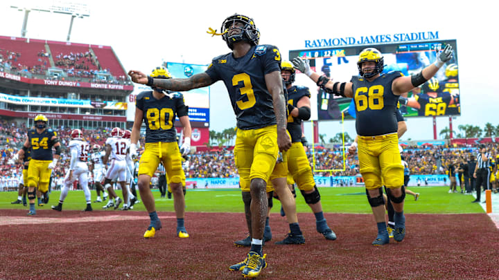 Dec 31, 2024; Tampa, FL, USA; Michigan Wolverines wide receiver Fredrick Moore (3) celebrates after scoring  a touchdown against the Alabama Crimson Tide in the first quarter during the ReliaQuest Bowl at Raymond James Stadium. Mandatory Credit: Nathan Ray Seebeck-Imagn Images