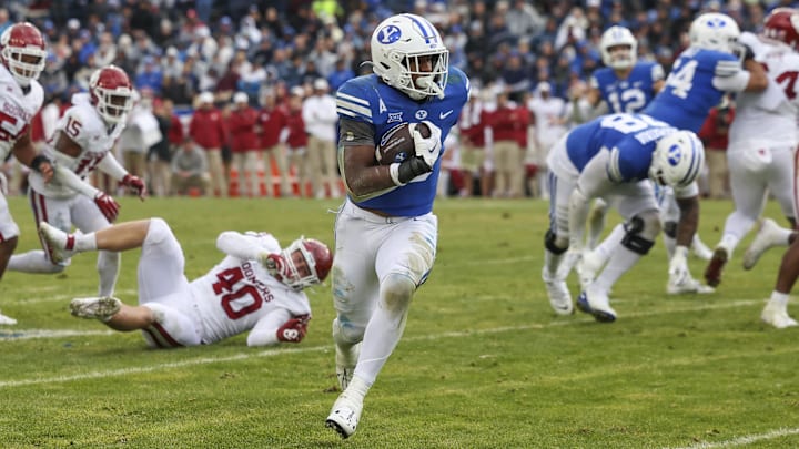 Nov 18, 2023; Provo, Utah, USA; Brigham Young Cougars running back Aidan Robbins (3) runs the ball