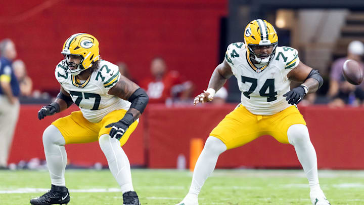 Oct 19, 2025; Glendale, Arizona, USA; Green Bay Packers guard Jordan Morgan (77) and center Elgton Jenkins (74) against the Arizona Cardinals at State Farm Stadium. Mandatory Credit: Mark J. Rebilas-Imagn Images