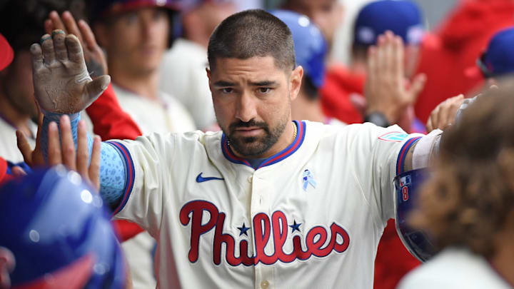 Jun 15, 2025; Philadelphia, Pennsylvania, USA; Philadelphia Phillies outfielder Nick Castellanos (8) celebrates his grand slam home run in the dugout during the sixth inning against the Toronto Blue Jays at Citizens Bank Park