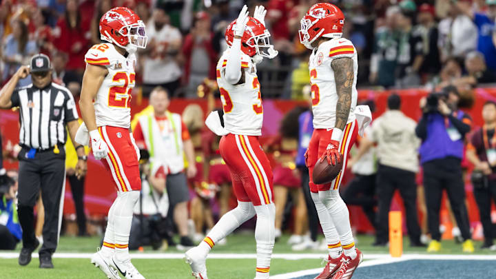 Feb 9, 2025; New Orleans, LA, USA;  Kansas City Chiefs safety Bryan Cook (6) celebrates with teammates Jaylen Watson (35) and Trent McDuffie (22) after an interception against the Philadelphia Eagles in the second quarter in Super Bowl LIX at Ceasars Superdome. Mandatory Credit: Mark J. Rebilas-Imagn Images