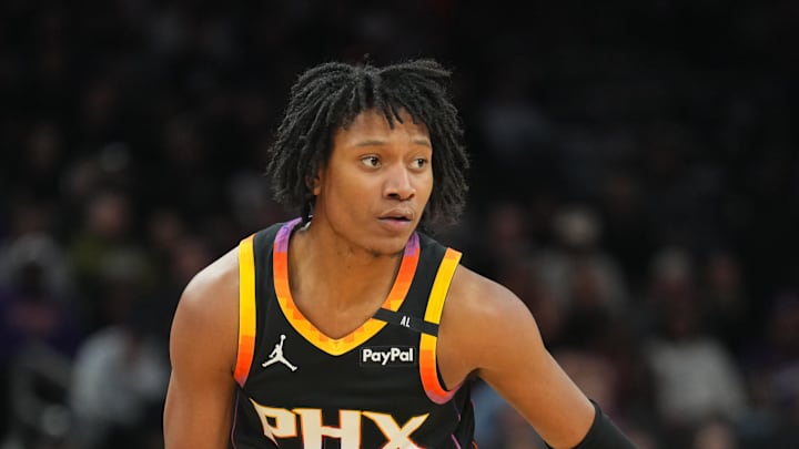 Feb 11, 2025; Phoenix, Arizona, USA; Phoenix Suns guard TyTy Washington Jr. (14) dribbles against the Memphis Grizzlies during the first half at Footprint Center. Mandatory Credit: Joe Camporeale-Imagn Images Feb 11, 2025; Phoenix, Arizona, USA; Phoenix Suns guard TyTy Washington Jr. (14) dribbles against the Memphis Grizzlies during the first half at Footprint Center. Mandatory Credit: Joe Camporeale-Imagn Images