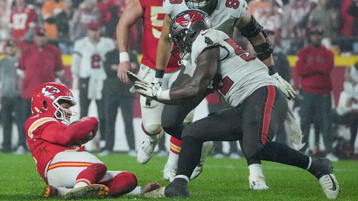 Kansas City Chiefs quarterback Patrick Mahomes (15) slides after a short run as Tampa Bay Buccaneers linebacker K.J. Britt (52) defends during the game at GEHA Field at Arrowhead Stadium. Kansas City Chiefs quarterback Patrick Mahomes (15) slides after a short run as Tampa Bay Buccaneers linebacker K.J. Britt (52) defends during the game at GEHA Field at Arrowhead Stadium.