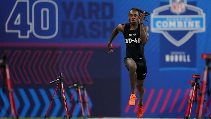 Mar 2, 2024; Indianapolis, IN, USA; Texas wide receiver Xavier Worthy (WO40) ran an official time of 4.21 seconds to set a combine record during the 2024 NFL Combine at Lucas Oil Stadium. Mandatory Credit: Kirby Lee-Imagn Images