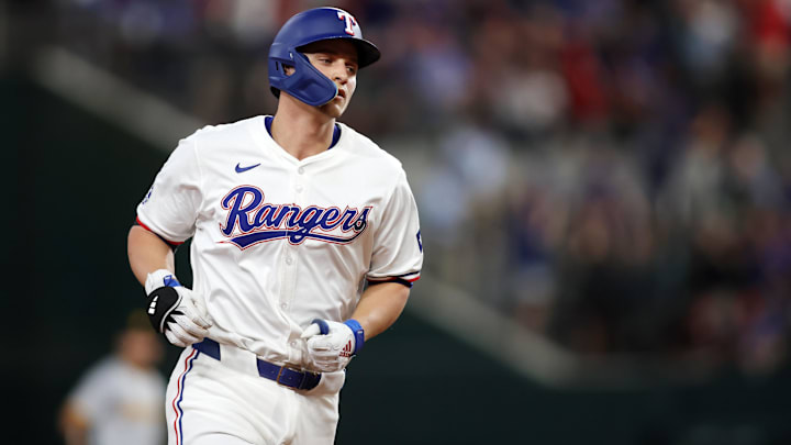 Aug 19, 2024; Arlington, Texas, USA; Texas Rangers shortstop Corey Seager (5) rounds the bases after hitting a home run against the Pittsburgh Pirates in the first inning at Globe Life Field. 
