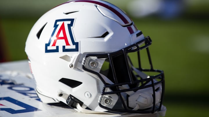 Nov 27, 2021; Tempe, Arizona, USA; Detailed view of an Arizona Wildcats helmet during the Territorial Cup at Sun Devil Stadium. Mandatory Credit: Mark J. Rebilas-Imagn Images Nov 27, 2021; Tempe, Arizona, USA; Detailed view of an Arizona Wildcats helmet during the Territorial Cup at Sun Devil Stadium. Mandatory Credit: Mark J. Rebilas-Imagn Images