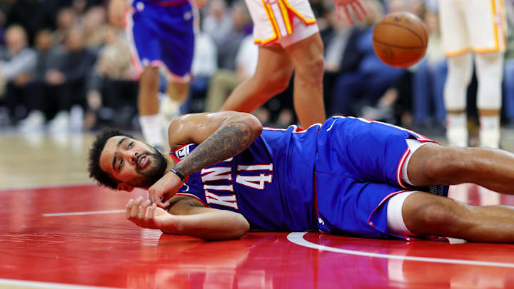 Nov 18, 2024; Sacramento, California, USA; Sacramento Kings forward Trey Lyles (41) lays on the ground after a play against the Atlanta Hawks during the third quarter at Golden 1 Center. Mandatory Credit: Sergio Estrada-Imagn Images