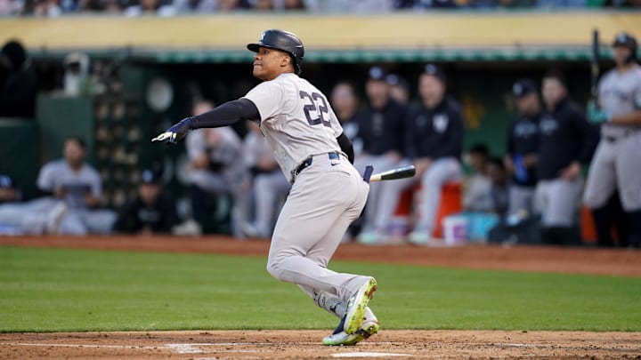 Sep 21, 2024; Oakland, California, USA; New York Yankees right fielder Juan Soto (22) hits a single against the Oakland Athletics in the third inning at the Oakland-Alameda County Coliseum. 