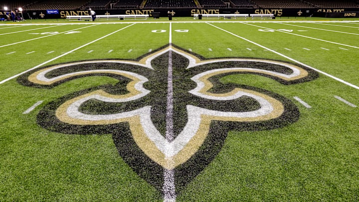 Oct 30, 2022; New Orleans, Louisiana, USA;  General view of the New Orleans Saints logo as the midfield logo fleur-de-lis after the game between the New Orleans Saints and the Las Vegas Raiders at Caesars Superdome. Mandatory Credit: Stephen Lew-Imagn Images