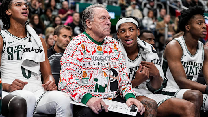 Michigan State head coach Tom Izzo talks to guard Jeremy Fears Jr. (1) from the bench during the second half against Oakland at Little Caesars Arena in Detroit on Saturday, Dec. 20, 2025.