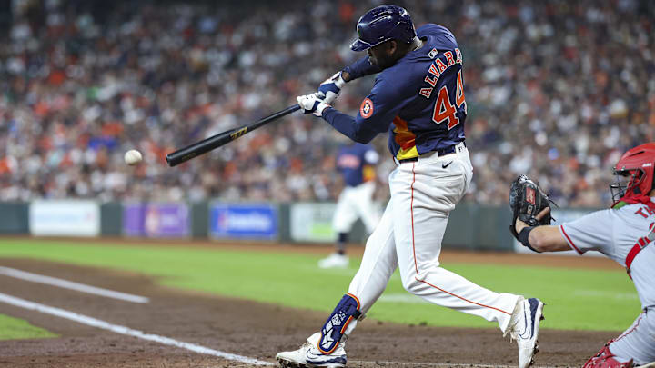 Sep 22, 2024; Houston, Texas, USA; Houston Astros left fielder Yordan Alvarez (44) hits a double during the third inning against the Los Angeles Angels at Minute Maid Park. 