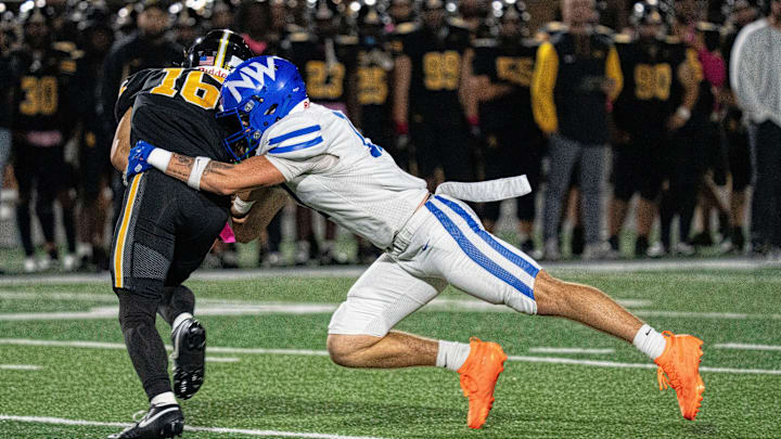 Waukee Northwest's Elliot Combe sacks Southeast Polk's Boston Bailey during a football game at Southeast Polk High School on Friday, Oct. 10, 2025, in Pleasant Hill.