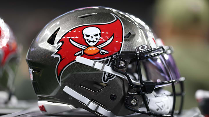 A Tampa Bay Buccaneers helmet is seen on the sidelines prior to a game against the New Orleans Saints 