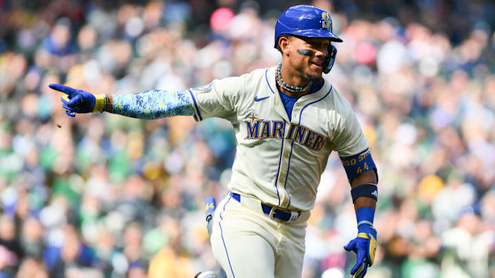 Seattle Mariners center fielder Julio Rodriguez celebrates after hitting a single against the Oakland Athletics on Sept. 29 at T-Mobile Park.