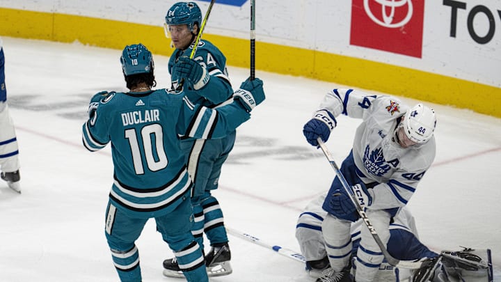 Jan 6, 2024; San Jose, California, USA; San Jose Sharks right wing Mitchell Russell (64) and San
