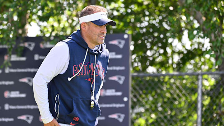 Jul 28, 2025; Foxborough, MA, USA; New England Patriots offensive coordinator Josh McDaniels heads to the practice fields for training camp at Gillette Stadium. Mandatory Credit: Eric Canha-Imagn Images