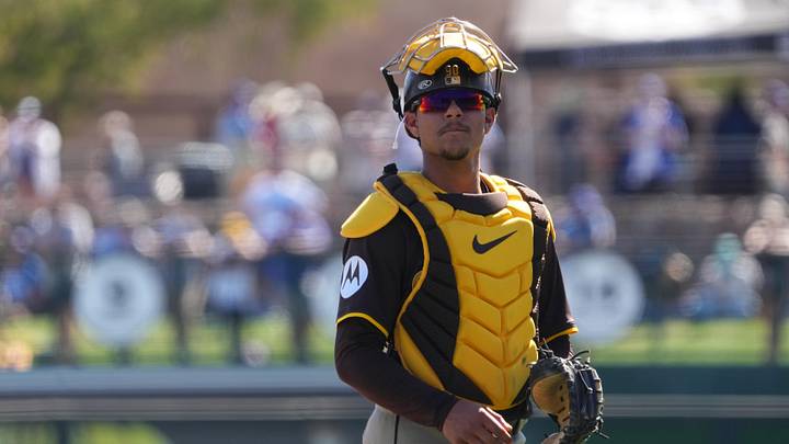 Feb 23, 2025; Phoenix, Arizona, USA; San Diego Padres catcher Ethan Salas (90) looks on against the Los Angeles Dodgers during the second inning at Camelback Ranch-Glendale. Mandatory Credit: Joe Camporeale-Imagn Images Feb 23, 2025; Phoenix, Arizona, USA; San Diego Padres catcher Ethan Salas (90) looks on against the Los Angeles Dodgers during the second inning at Camelback Ranch-Glendale. Mandatory Credit: Joe Camporeale-Imagn Images