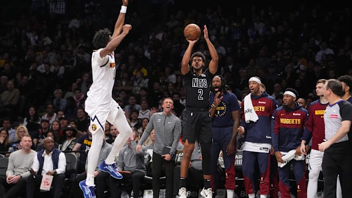 Oct 29, 2024; Brooklyn, New York, USA; Brooklyn Nets small forward Cameron Johnson (2) shoots a three point jump shot over Denver Nuggets forward Peyton Watson (8) during the second half at Barclays Center. Mandatory Credit: Gregory Fisher-Imagn Images Oct 29, 2024; Brooklyn, New York, USA; Brooklyn Nets small forward Cameron Johnson (2) shoots a three point jump shot over Denver Nuggets forward Peyton Watson (8) during the second half at Barclays Center. Mandatory Credit: Gregory Fisher-Imagn Images