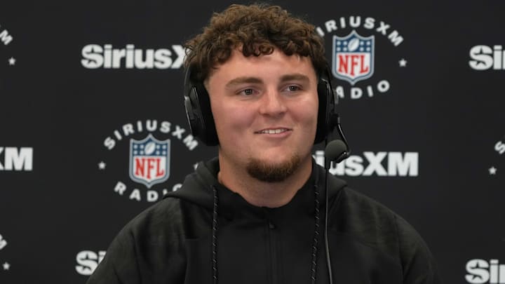 Feb 26, 2025; Indianapolis, IN, USA; Michigan defensive lineman Mason Graham (DL11) on the SiriusXM radio set during the 2025 NFL Scouting Combine at the Indiana Convention Center. Mandatory Credit: Kirby Lee-Imagn Images