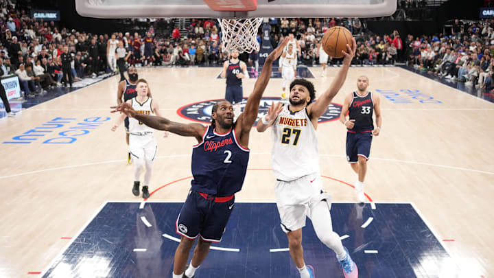Denver Nuggets guard Jamal Murray (27) shoots the ball against LA Clippers forward Kawhi Leonard (2) in the second half during game six of first round for the 2025 NBA Playoffs at Intuit Dome. Mandatory Credit: Kirby Lee-Imagn Images Denver Nuggets guard Jamal Murray (27) shoots the ball against LA Clippers forward Kawhi Leonard (2) in the second half during game six of first round for the 2025 NBA Playoffs at Intuit Dome. Mandatory Credit: Kirby Lee-Imagn Images