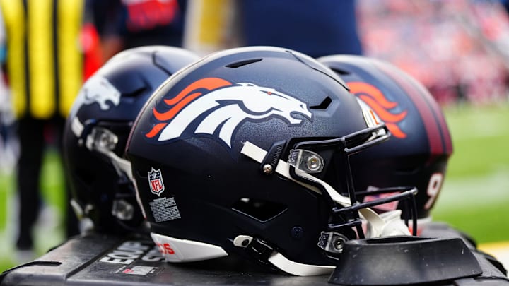 Aug 25, 2024; Denver, Colorado, USA; Detail view of the helmets worn by the Denver Broncos during the second half against the Arizona Cardinals t Empower Field at Mile High. Mandatory Credit: Ron Chenoy-Imagn Images