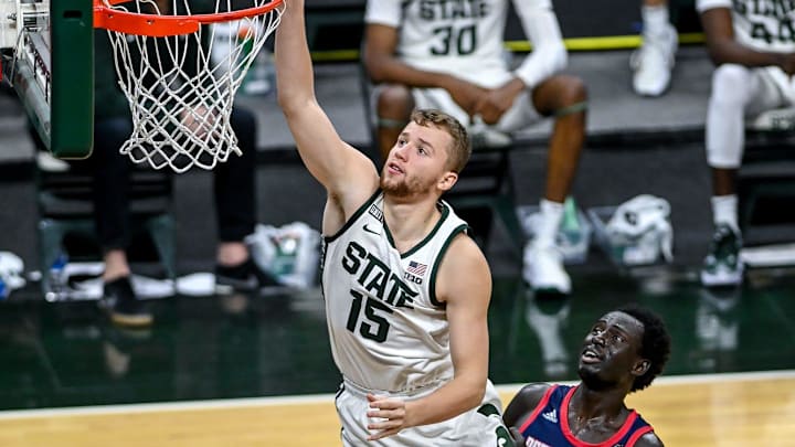 Michigan State's Thomas Kithier scores against Detroit Mercy during the second half on Friday, Dec. 4, 2020, at the Breslin Center in East Lansing.

201204 Msu Det Mercy 102a