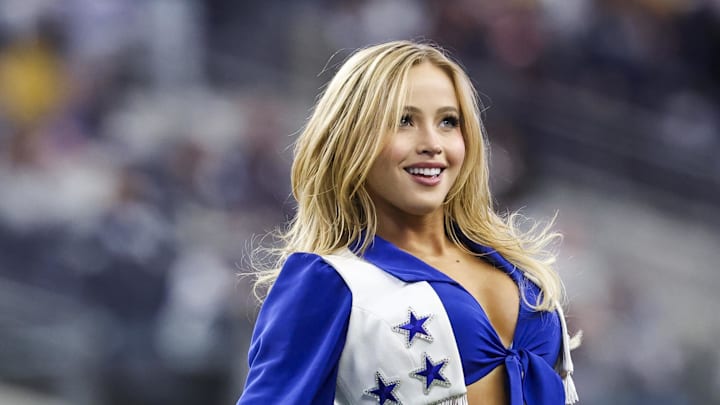 Jan 5, 2025; Arlington, Texas, USA; Dallas Cowboys cheerleader performs during the game against the Washington Commanders at AT&T Stadium. 