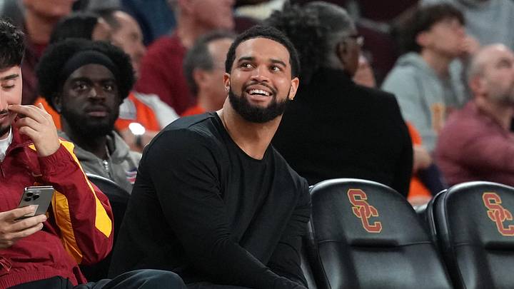 Feb 18, 2026; Los Angeles, California, USA; Chicago Bears quarterback Caleb Williams watches in the second half of the game between the Illinois Fighting Illini and the Southern California Trojans at Galen Center. Mandatory Credit: Kirby Lee-Imagn Images
