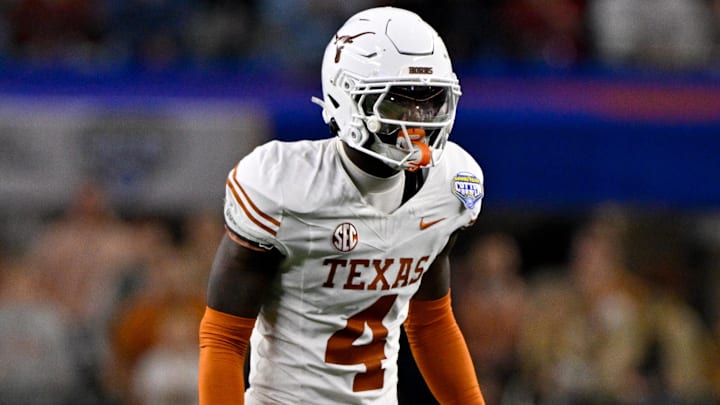 Jan 10, 2025; Arlington, TX, USA; Texas Longhorns defensive back Andrew Mukuba (4) in action during the game between the Texas Longhorns and the Ohio State Buckeyes at AT&T Stadium. Mandatory Credit: Jerome Miron-Imagn Images