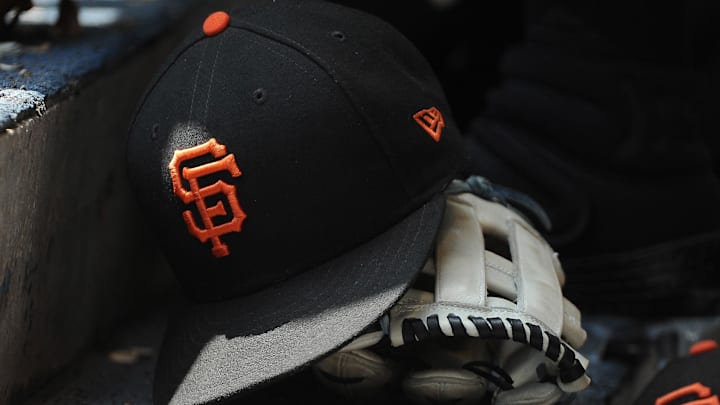 Jul 14, 2019; Milwaukee, WI, USA; San Francisco Giants hat and glove in the dug out at Miller Park. Mandatory Credit: Michael McLoone-Imagn Images Jul 14, 2019; Milwaukee, WI, USA; San Francisco Giants hat and glove in the dug out at Miller Park. Mandatory Credit: Michael McLoone-Imagn Images