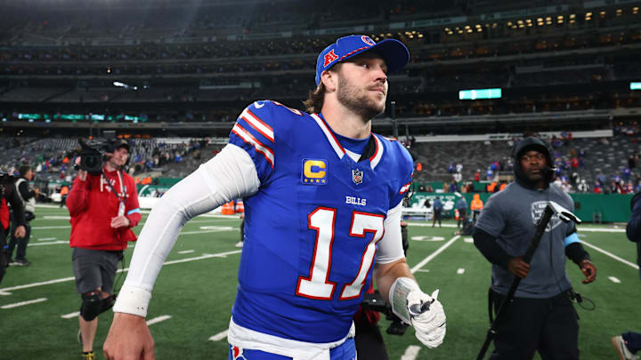 Buffalo Bills quarterback Josh Allen (17) runs off the field after the Buffalo Bills win over the New York Jets at MetLife Stadium. Buffalo Bills quarterback Josh Allen (17) runs off the field after the Buffalo Bills win over the New York Jets at MetLife Stadium.