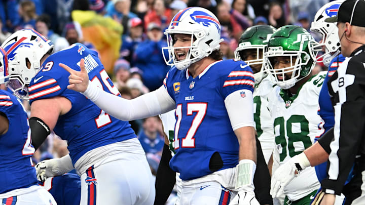 Buffalo Bills quarterback Josh Allen celebrates after scoring a rushing touchdown against the New York Jets.