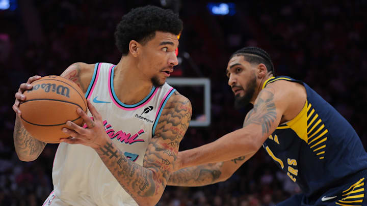 Feb 28, 2025; Miami, Florida, USA; Miami Heat center Kel'el Ware (7) protects the basketball from Indiana Pacers forward Obi Toppin (1) during the third quarter at Kaseya Center. Mandatory Credit: Sam Navarro-Imagn Images Feb 28, 2025; Miami, Florida, USA; Miami Heat center Kel'el Ware (7) protects the basketball from Indiana Pacers forward Obi Toppin (1) during the third quarter at Kaseya Center. Mandatory Credit: Sam Navarro-Imagn Images
