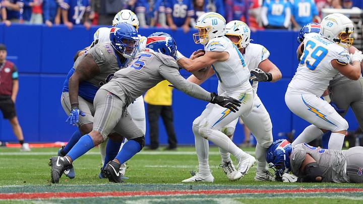 Sep 27, 2026; Orchard Park, New York, USA;  Buffalo Bills linebacker Greg Rousseau (15) sacks Los Angeles Chargers quarterback Justin Herbert (10) during the fourth quarter at Former Highmark Stadium. 