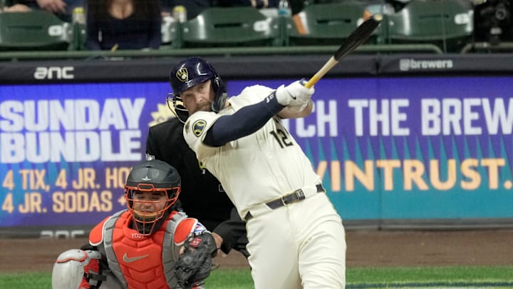 Milwaukee Brewers first base Rhys Hoskins (12) hits an RBI double during the eighth inning of their game against the Houston Astros Monday, May 5, 2025 at American Family Field in Milwaukee, Wisconsin.