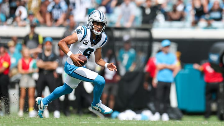 Sep 7, 2025; Jacksonville, Florida, USA; Carolina Panthers quarterback Bryce Young (9) carries the ball against the Jacksonville Jaguars during the first half at EverBank Stadium. Mandatory Credit: Nathan Ray Seebeck-Imagn Images