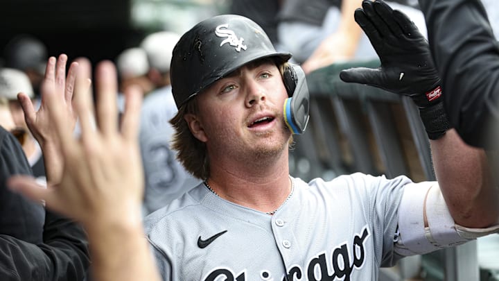 Chicago White Sox shortstop Chase Meidroth (10) celebrates with teammates in the dugout after hitting a solo home run against the Chicago Cubs during the first inning at Wrigley Field. Mandatory Credit: Kamil Krzaczynski-Imagn Images