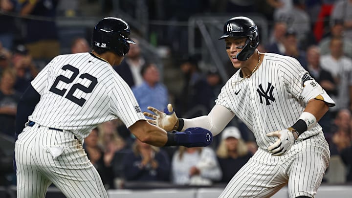 Sep 26, 2024; Bronx, New York, USA; New York Yankees center fielder Aaron Judge (99) celebrates with right fielder Juan Soto (22) after hitting a two run home run during the seventh inning against the Baltimore Orioles at Yankee Stadium. Mandatory Credit: Vincent Carchietta-Imagn Images