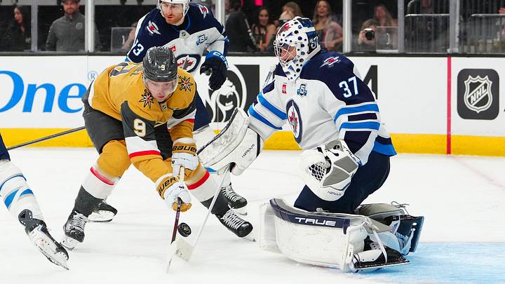 Winnipeg Jets goaltender Connor Hellebuyck (37) makes a save against Vegas Golden Knights center Jack Eichel (9) during the second period at T-Mobile Arena. Mandatory Credit: Stephen R. Sylvanie-Imagn Images Winnipeg Jets goaltender Connor Hellebuyck (37) makes a save against Vegas Golden Knights center Jack Eichel (9) during the second period at T-Mobile Arena. Mandatory Credit: Stephen R. Sylvanie-Imagn Images