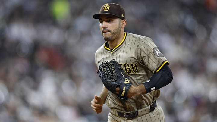 Sep 19, 2025; Chicago, Illinois, USA; San Diego Padres left fielder Ramon Laureano (5) returns to the dugout after the seventh inning of a baseball game against the Chicago White Sox at Rate Field. Mandatory Credit: Kamil Krzaczynski-Imagn Images