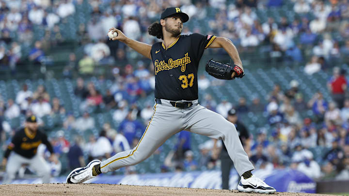 Pittsburgh Pirates starting pitcher Jared Jones (37) delivers a pitch against the Chicago Cubs during the first inning at Wrigley Field.
