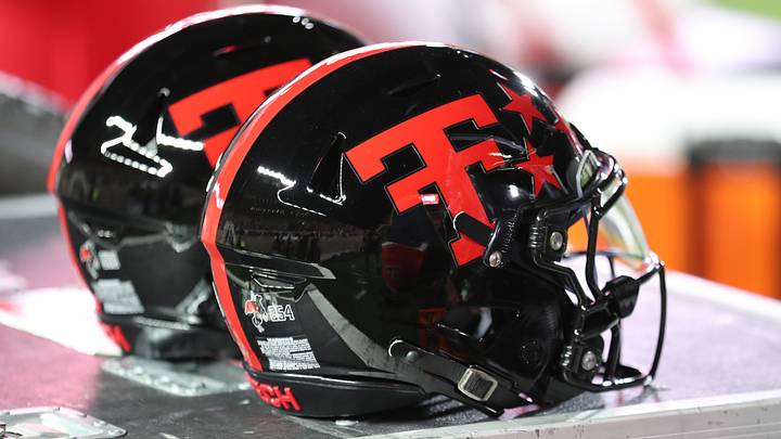 Oct 11, 2025; Lubbock, Texas, USA; A general view of Texas Tech Red Raiders helmets in the second half on the bench during the game against the Kansas Jayhawks at Jones AT&T Stadium. Mandatory Credit: Michael C. Johnson-Imagn Images Oct 11, 2025; Lubbock, Texas, USA; A general view of Texas Tech Red Raiders helmets in the second half on the bench during the game against the Kansas Jayhawks at Jones AT&T Stadium. Mandatory Credit: Michael C. Johnson-Imagn Images