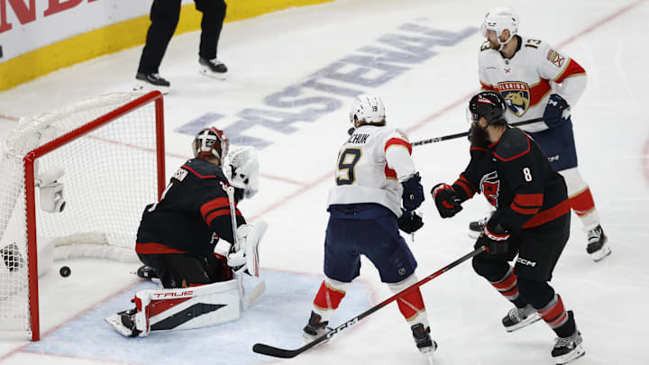 May 28, 2025; Raleigh, North Carolina, USA; Florida Panthers forward Matthew Tkachuk (19) tips in a shot from defenseman Aaron Ekblad (5) during a power play second period against the Carolina Hurricanes in game five of the Eastern Conference Final of the 2025 Stanley Cup Playoffs at Lenovo Center. 
