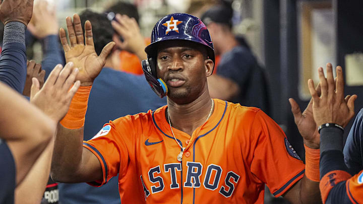Sep 13, 2025; Cumberland, Georgia, USA; Houston Astros right fielder Jesus Sanchez (4) reacts after scoring a run against the Atlanta Braves during the third inning at Truist Park. Mandatory Credit: Dale Zanine-Imagn Images