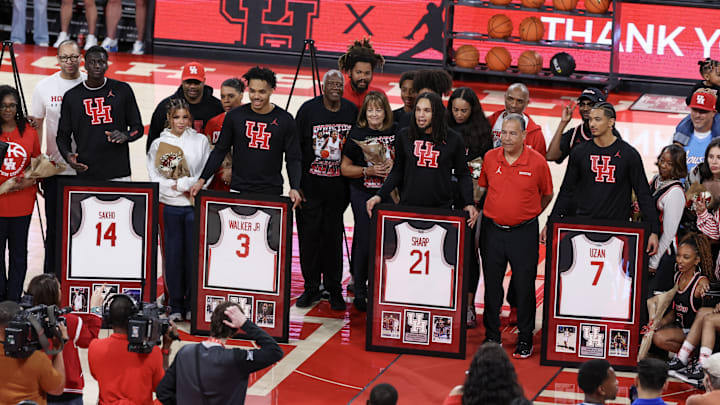 Mar 4, 2026; Houston, Texas, USA; Houston Cougars forward Kalifa Sakho (14) guard Ramon Walker Jr. (3) guard Emanuel Sharp (21) and guard Milos Uzan (7) are introduced on Senior night before playing against the Baylor Bears at Fertitta Center. Mandatory Credit: Thomas Shea-Imagn Images