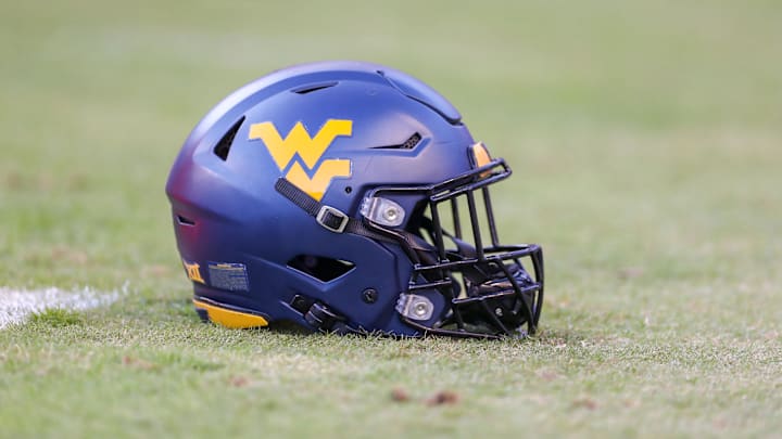Oct 23, 2021; Fort Worth, Texas, USA; A West Virginia Mountaineers helmet is seen on the field prior to the game against the TCU Horned Frogs at Amon G. Carter Stadium. Mandatory Credit: Ben Queen-Imagn Images Oct 23, 2021; Fort Worth, Texas, USA; A West Virginia Mountaineers helmet is seen on the field prior to the game against the TCU Horned Frogs at Amon G. Carter Stadium. Mandatory Credit: Ben Queen-Imagn Images