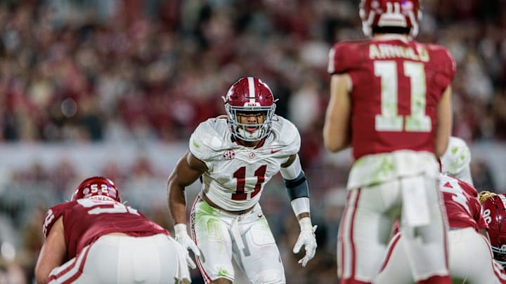 Nov 23, 2024; Norman, Oklahoma, USA;  Alabama Crimson Tide linebacker Jihaad Campbell (11) ready for the play during the third quarter against the Oklahoma Sooners at Gaylord Family-Oklahoma Memorial Stadium. Mandatory Credit: William Purnell-Imagn Images