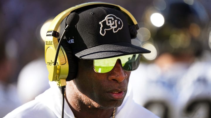 Colorado Buffaloes head coach Deion Sanders walks the sidelines as his team takes on the ASU Sun Devils at Mountain America Stadium in Tempe on Oct. 7, 2023.