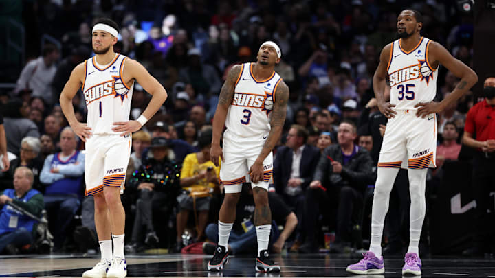 Jan 8, 2024; Los Angeles, California, USA;  Phoenix Suns guard Devin Booker (1) and guard Bradley Beal (3) and forward Kevin Durant (35) stands on the floor during the fourth quarter against the Los Angeles Clippers at Crypto.com Arena. Mandatory Credit: Kiyoshi Mio-Imagn Images
